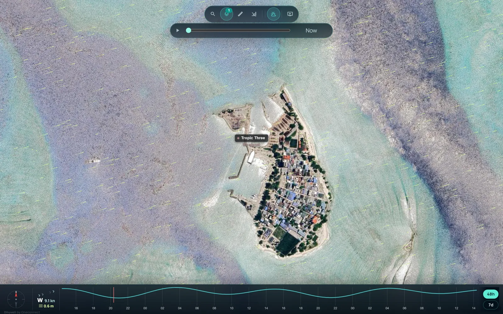 The Dhuveli live map on satellite imagery: a vessel at Gulhi's jetty, the wind streaming over the lagoon, and the tide for the next two days along the bottom